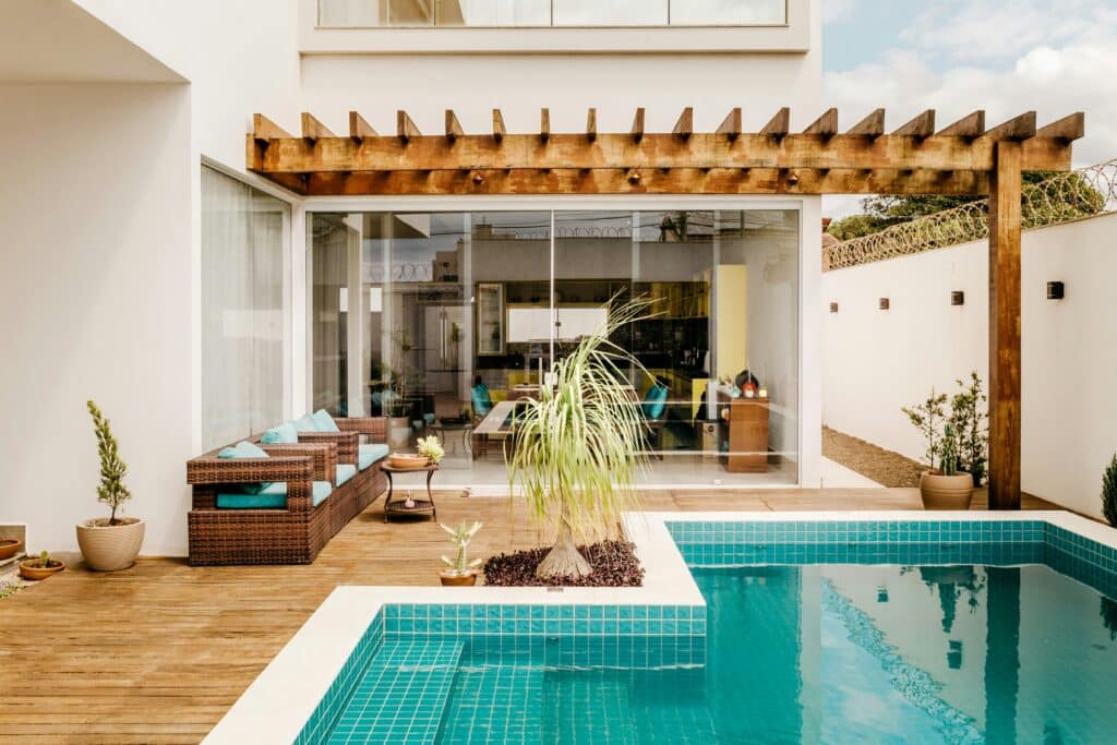 backyard deck with a pool